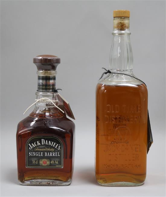 A bottle of Single Barrel Jack Daniels and an 1895 Replica bottle Jack Daniels